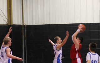 Boy's basketball - blocking the shot