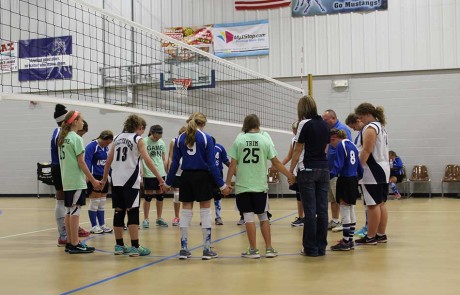 Praying before the volleyball match