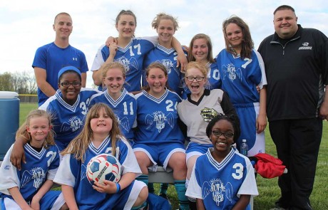 girls soccer team before their first game